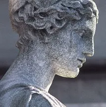 Face of granite statue looking to the right